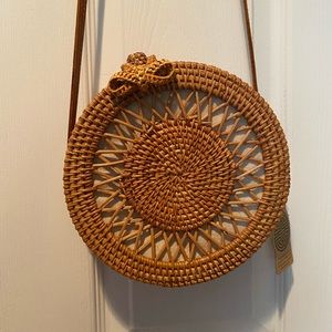 Handwoven round rattan crossbody